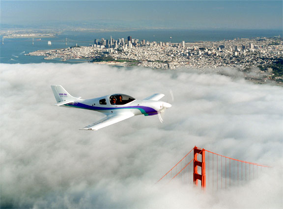 Lancair kitplane over the Golden Gate Bridge